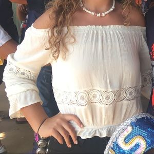 Off the shoulder cream blouse